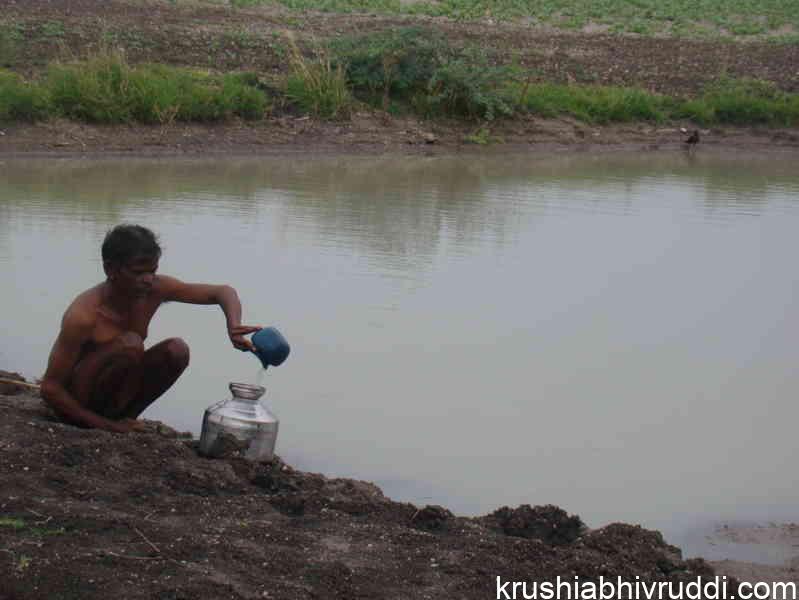 Man collecting water 